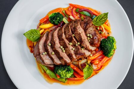 beautiful dishes with beef peas and vegetables, healthy foodの写真素材