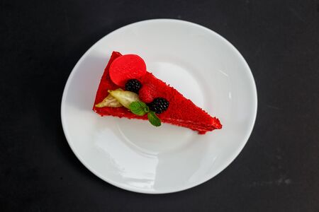 delicious red velvet cake with berries and mint, dessertの写真素材