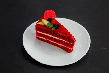 delicious red velvet cake with berries and mint, dessertの写真素材