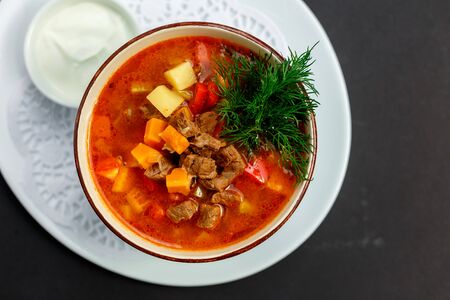 hot soup with broth and stew with vegetablesの写真素材