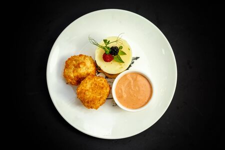 delicious nuggets with mashed potatoes and gravyの写真素材