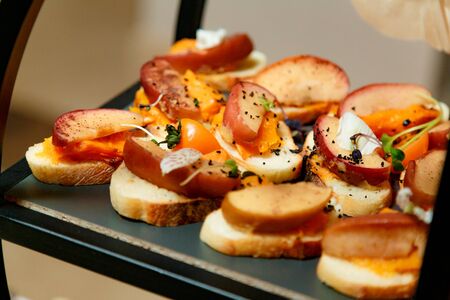 snacks with apple and cinnamon breadの写真素材