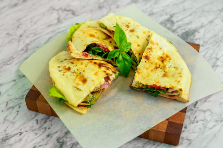 quesadillas with vegetables and jalapenos with sauceの写真素材