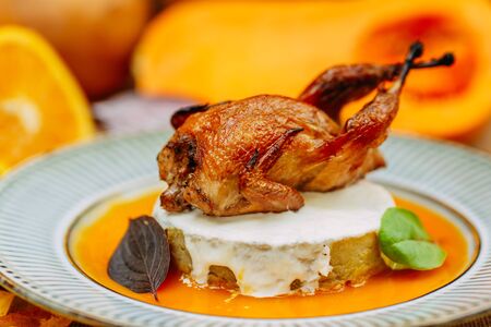 Autumn table setting with pumpkins. Thanksgiving dinner.Hosper Chicken with BBQ Sauceの写真素材