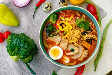 ramen noodles with korean noodles served on the tableの写真素材