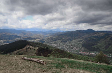 top view of rural town in the mountain valley at cloudy dayの写真素材