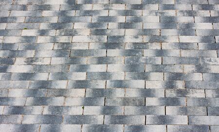 City sidewalk made of gray tilesの写真素材