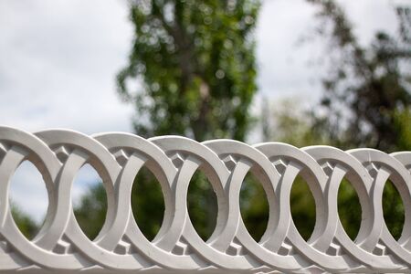 White round brick rings on a blurred park backgroundの写真素材