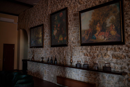Shato Trubetskogo, Ukraine - June 15, 2021: Summer vacation in Ukraine. Excursion for tourists to explore most popular natural wines. Ukrainian ancient winery. Entrence with old paintings as museumのeditorial素材