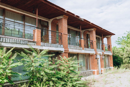 Nikolaev, Ukraine - June 18, 2021: abandoned complex for the rest out of the city with a swimming pool. Old Place for the rest and wedding, different holidays and rest of people during summer timeのeditorial素材