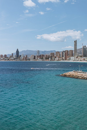 Benidorm, Alicante, Spain. Aerial photo from drone to Benidorm city skyline with beach and mountains in the background. These are the most beautiful views from the drone to the skyscrapersの写真素材