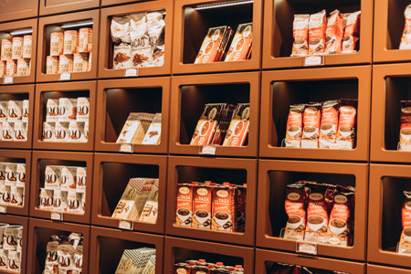 Villajoyosa, Spain - May 16, 2023: exhibition at the shop in chocolate factory "Valor". View of candy bars in a chocolate cafe. Valor is a Spanish brand of chocolate and candies.の写真素材