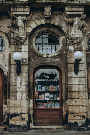 Lviv, Ukraine- May 13, 2023: Facade of the popular bookstore. Architecture and education concept. Old facade of the building, city Lviv architectureのeditorial素材