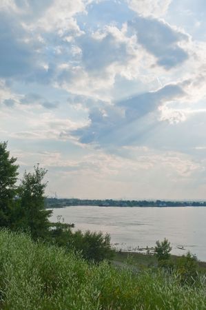 summer landscape with river and blue skyの写真素材