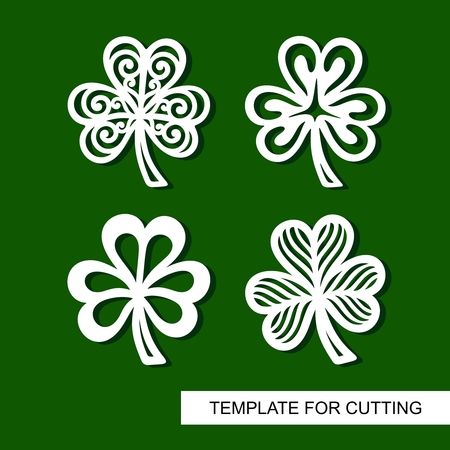 Set of decoration for St. Patrick's Day. Collection of openwork shamrock. Clover icon. Template for laser cutting, wood carving, paper cut and printing. Vector silhouette of element.のイラスト素材