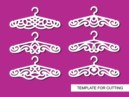 Set of wedding clothes, hangers for atelier, wedding salon, boutique, store. Black objects on white background. Template for laser cutting, wood carving, paper cutting and printing. Vector illustration.のイラスト素材