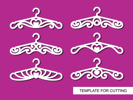 Set of wedding clothes, hangers for atelier, wedding salon, boutique, store. Black objects on white background. Template for laser cutting, wood carving, paper cutting and printing. Vector illustration.のイラスト素材