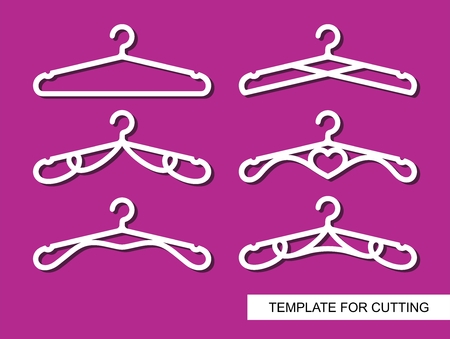Set of wedding clothes, hangers for atelier, wedding salon, boutique, store. Black objects on white background. Template for laser cutting, wood carving, paper cutting and printing. Vector illustration.のイラスト素材