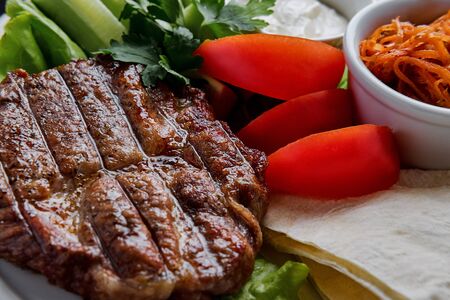 Delicious barbecue meat grilled with vegetablesの写真素材