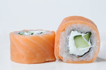 Fresh japanese sushi rolls on a white backgroundの写真素材