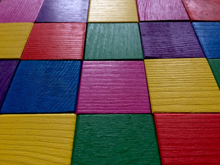 Colorful wooden cubes background. Perspective view.
