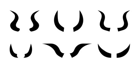 Set of Black silhouettes of Horns. Demon Horns for Halloween costume. Fantasy, spooky, horror hand drawn element isolated on white background. Different shapes and lengths, straight and curvedのイラスト素材