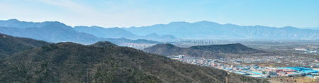 See north-west of the town and mountains from the Beijing Baiwangshan Peakの写真素材