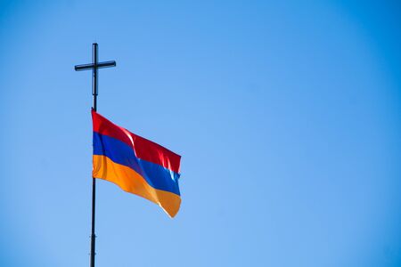 The national flag of Armenia on the background of clear skyの写真素材