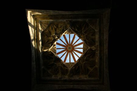 Window on the ceiling of an ancient churchの写真素材