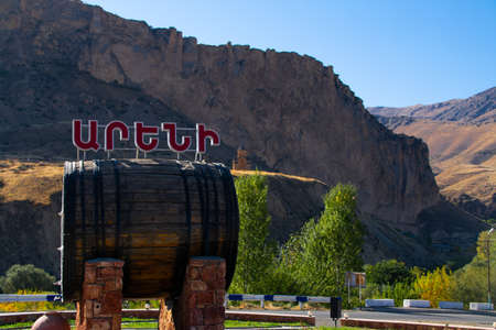 A large wine barrel against the background of mountainsのeditorial素材