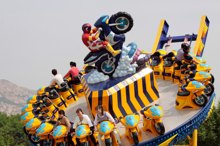 Rotating motorcycle game.のeditorial素材