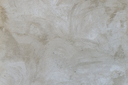 gray putty on a wall, texture cement wall, plasterの写真素材