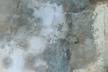 grunge old house wall. textured background. plaster gray and blue hueの写真素材