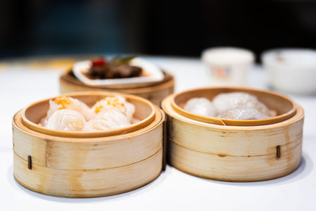 Hong Kong, China â€“ Authentic Dim Sum in Bamboo Steamers: Shrimp Dumplings, Har Gow, and Other