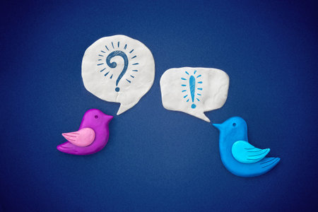 Birds symbol carry on dialog with each other. Plasticine illustration.