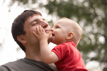 son kissing his fatherの写真素材