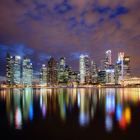 Singapore city skyline at night with reflectionのeditorial素材