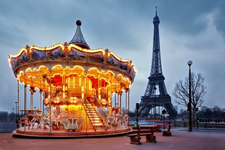 illuminated vintage carousel close to Eiffel Tower, Parisの写真素材