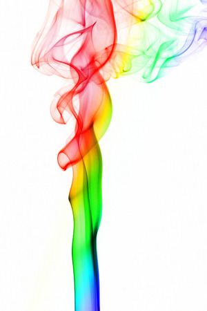 rainbow colorful smoke on white backgroundの写真素材