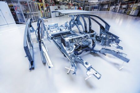 divided automobile body at car plantの写真素材