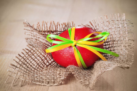 easter eggs with ribbon in the nestの写真素材