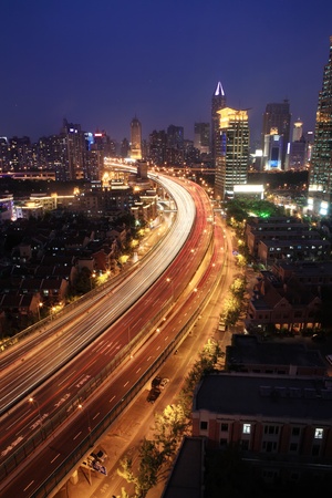 traffic through downtown at nightのeditorial素材