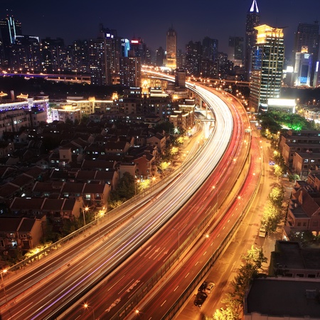 traffic through downtown at nightのeditorial素材