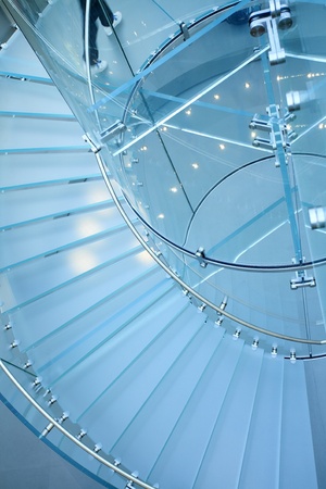 modern glass spiral staircase in shop with motion stepのeditorial素材
