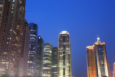 SHANGHAI - JUL 20: Jin Mao Tower and Shanghai word financial center (who is the TOP 3 high in this word and TOP 1 high in China,total high 493 meters,the left tower)  JUL 20, 2010 in Shanghai, CN. のeditorial素材
