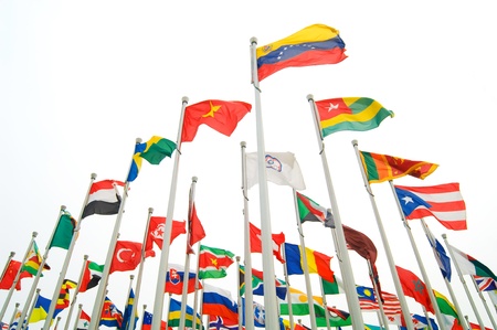 Many countries flag flying with skyのeditorial素材