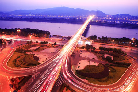 traffic on night road junction with long exposure 