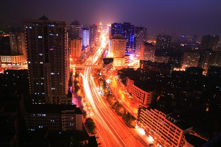 the light trails on the modern building backgroundのeditorial素材