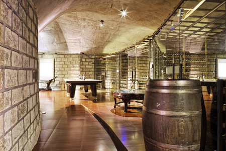 Wine cellar with wine bottle and glasses 