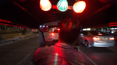 Bangkok,thailand-October 2,2014: tourist take thailand tuk-tuk  passing tunnel.のeditorial素材